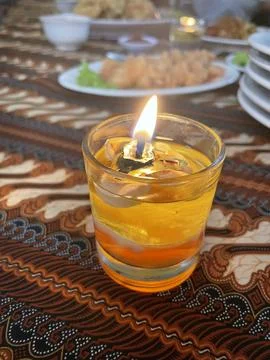 Decorative candles for the dining table Stock Photos