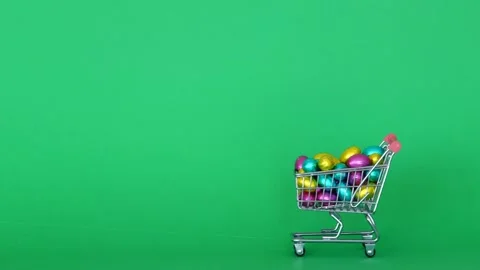 Decorative cart with easter eggs moves on green screen Stock Footage 245583043