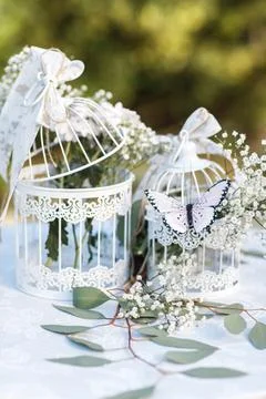 Decorative cell on the table with flowers Stock Photos