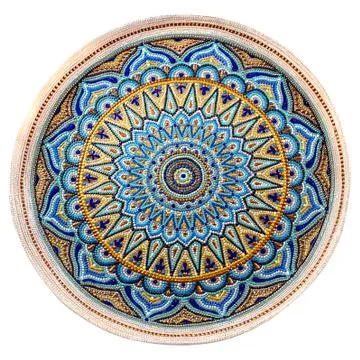Decorative ceramic dish painted with a circular pattern, isolated on a white  Stock Photos