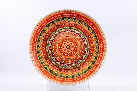 Decorative ceramic dish painted with hands. Art, handmade. Stock Photos