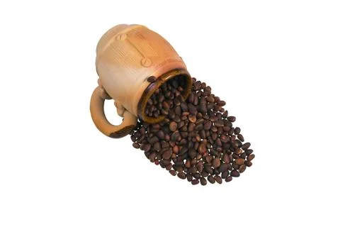 Decorative ceramic mug with pine nuts. Stock Photos