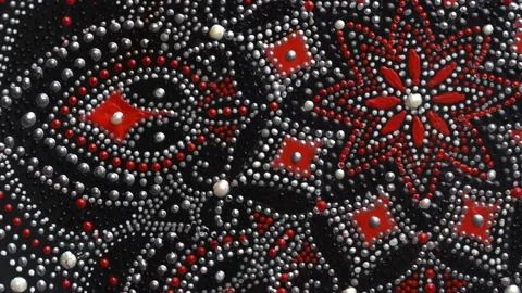 Decorative ceramic plate with red and silver colors, painted plate rotate Stock Footage 145364705
