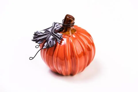 Decorative ceramic pumpkin on a white background. Foto stock