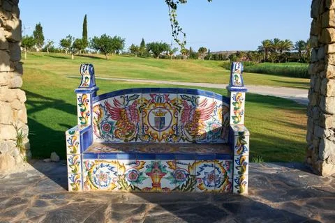 Decorative ceramic tiled bench in the Algorfa. Province Alicante, Spain. Golf Stock Photos