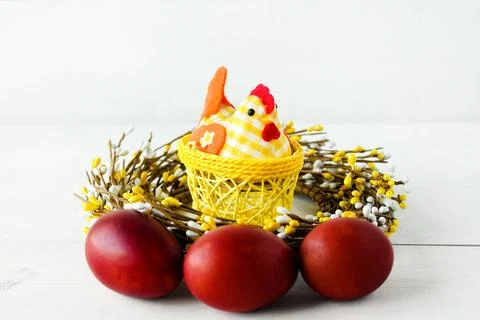 Decorative chicken with Easter eggs on a white isolated background Stock Photos
