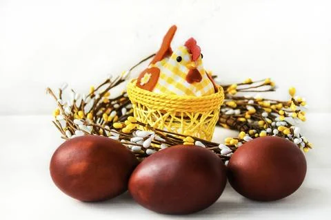 Decorative chicken with Easter eggs on a white isolated background Stock Photos