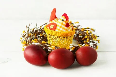 Decorative chicken with Easter eggs on a white isolated background Stock Photos