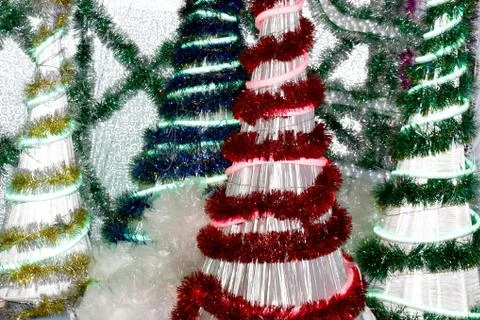 Decorative Christmas tree made of tinsel for the new year holiday or Christmas Stock Photos