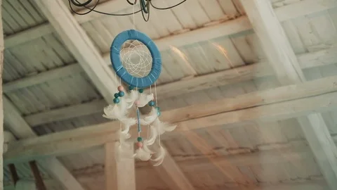 Decorative Circle With Feathers Hanging On The Ceiling. Stock-Footage 108678774