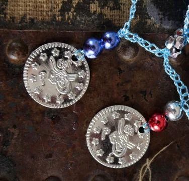 Decorative coins Stock Photos