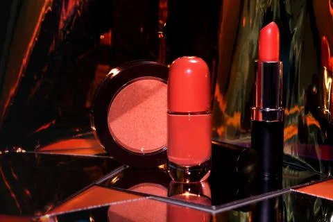 Decorative composition with cosmetics with mirror reflection Stock Photos