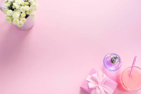 Decorative composition flat lay set of items flowers perfume cocktail gift Top Stock Photos