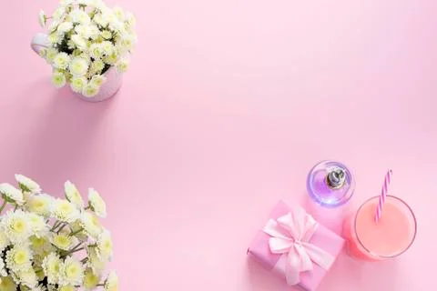 Decorative composition flat lay set of items flowers perfume cocktail gift Top Stock Photos