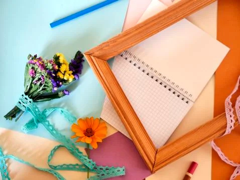 Decorative composition of hand-crafted items on yellow toned pape Stock Photos