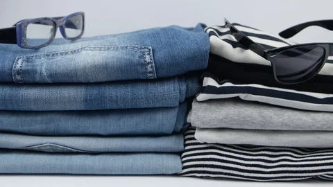 Decorative composition with jeans and t-shirts, advertising Stock Footage 102312702