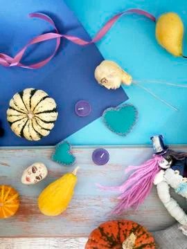 Decorative composition of pumpkins, pears, stitched dolls and felt hearts Stock Photos