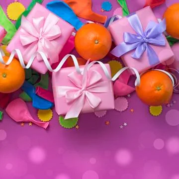 Decorative composition three boxes with gifts Satin ribbon Bow Oranges Confet Stock Photos