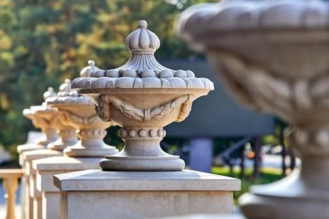 Decorative concrete vases on the balustrade Stock Photos