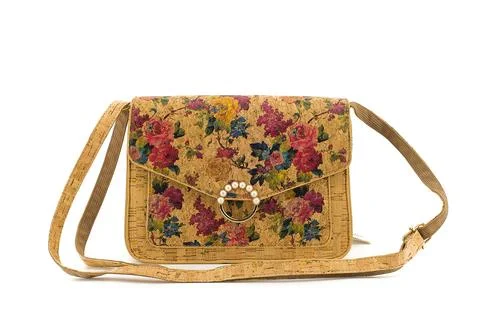 Decorative cork purse featuring multicolor geometric pattern. Stock Photos
