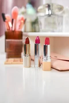 Decorative cosmetics on dressing table Stock Photos