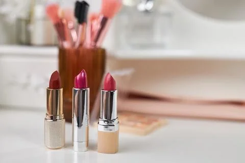 Decorative cosmetics on dressing table Stock Photos