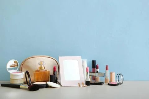 Decorative cosmetics for makeup on a dressing table close-up. Photos