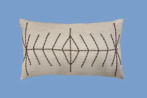 Decorative cushion with knitted geometric pattern Stock Photos