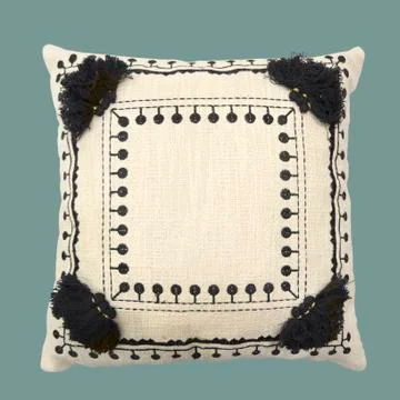 Decorative cushion with knitted pattern. Foto stock