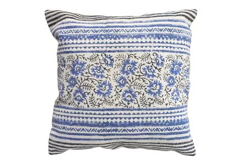 Decorative cushion with knitted pattern. Stock Photos