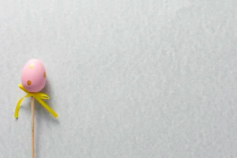 Decorative decoration in the form of Easter eggs on a gently blue background. Stock Photos