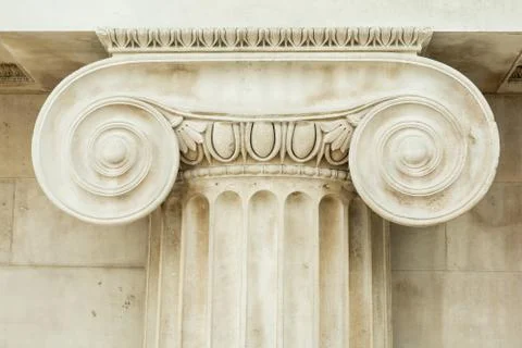 Decorative detail of an ancient Ionic column Stock Photos