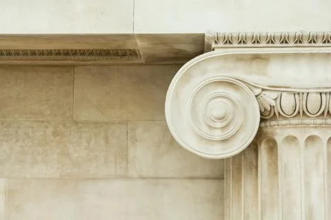 Decorative detail of an ancient Ionic column Stock Photos