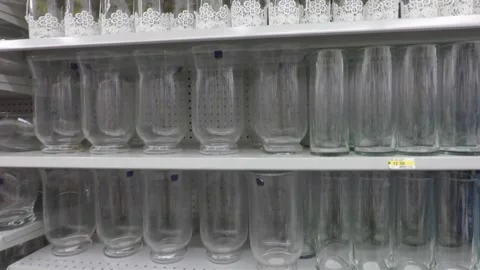 Decorative drinking glasses ,  glassware on store shelves Stock-Footage 163616169
