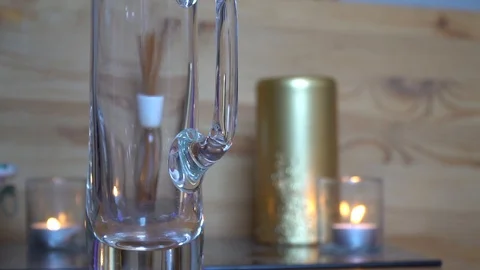 Decorative dry rose leaf slow motion fall down into the glass Video stock 92090764