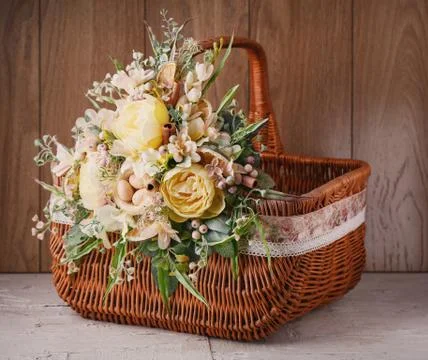 Decorative Easter basket with flowers Stock Photos