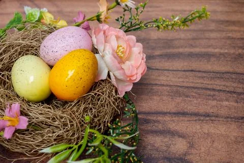 Decorative Easter Display Featuring Colorful Eggs And Blooming Flowers Stock Photos