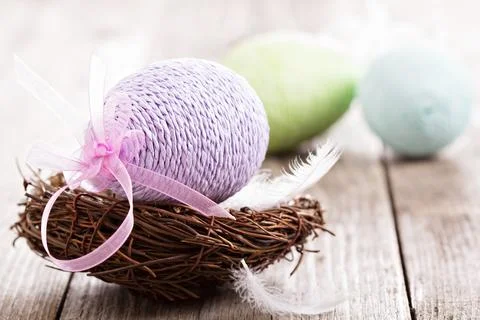 Decorative Easter egg in a nest Стоковые фото