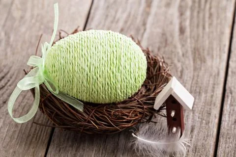 Decorative Easter egg in a nest Стоковые фото