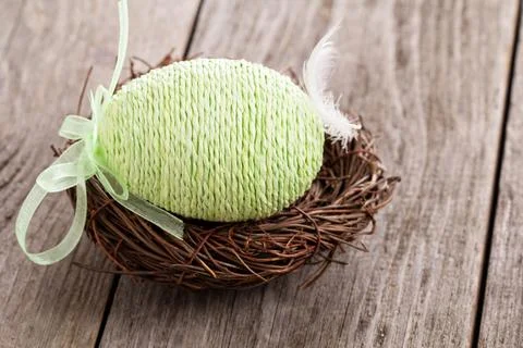 Decorative Easter egg in a nest Стоковые фото