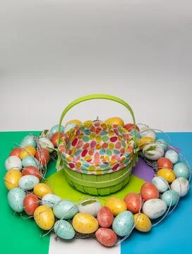 Decorative easter egg wreath with basket for greeting card template. Easter.. Stock Photos