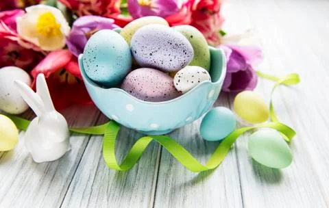 Decorative Easter eggs and tulips Stock Photos