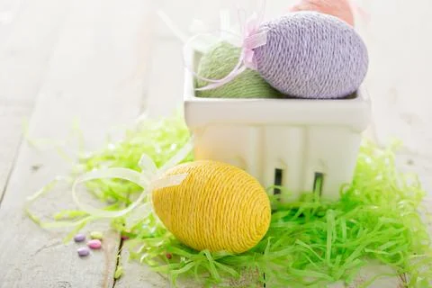 Decorative Easter eggs in a basket Stock Photos