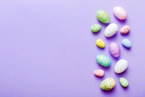 Decorative easter eggs on colored background. easter eggs collection top view Stock Photos