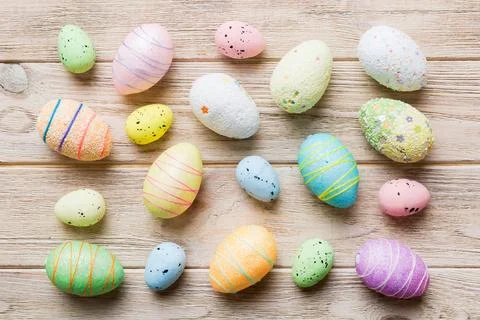 Decorative easter eggs on colored background. easter eggs collection top view Stock Photos