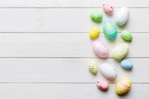 Decorative easter eggs on colored background. easter eggs collection top view Stock Photos