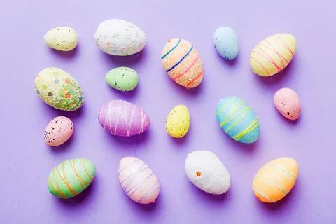 Decorative easter eggs on colored background. easter eggs collection top view Stock Photos
