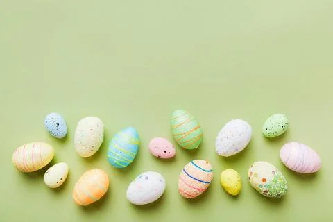 Decorative easter eggs on colored background. easter eggs collection top view Stock Photos