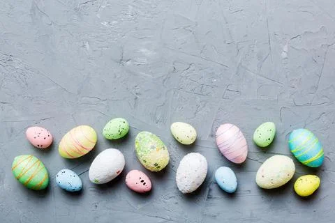 Decorative easter eggs on colored background. easter eggs collection top view Stock Photos
