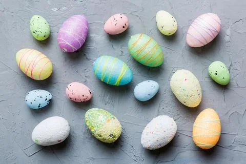 Decorative easter eggs on colored background. easter eggs collection top view Stock Photos